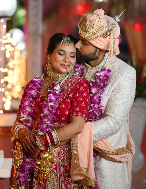 bride and groom embracing 